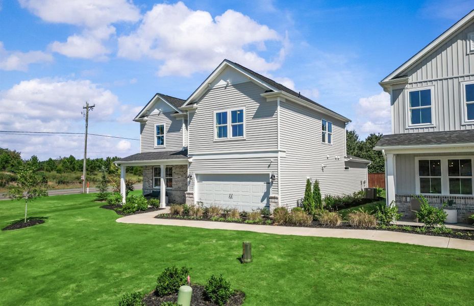 Front exterior of a new home in Fox Hollow, Spartanburg, SC, highlighting curb appeal (Image 21).