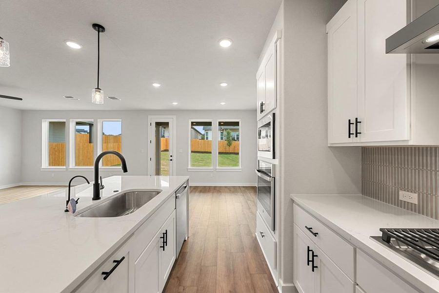Furnished interior view inside a new home in Heritage, Dripping Springs (Image 6).