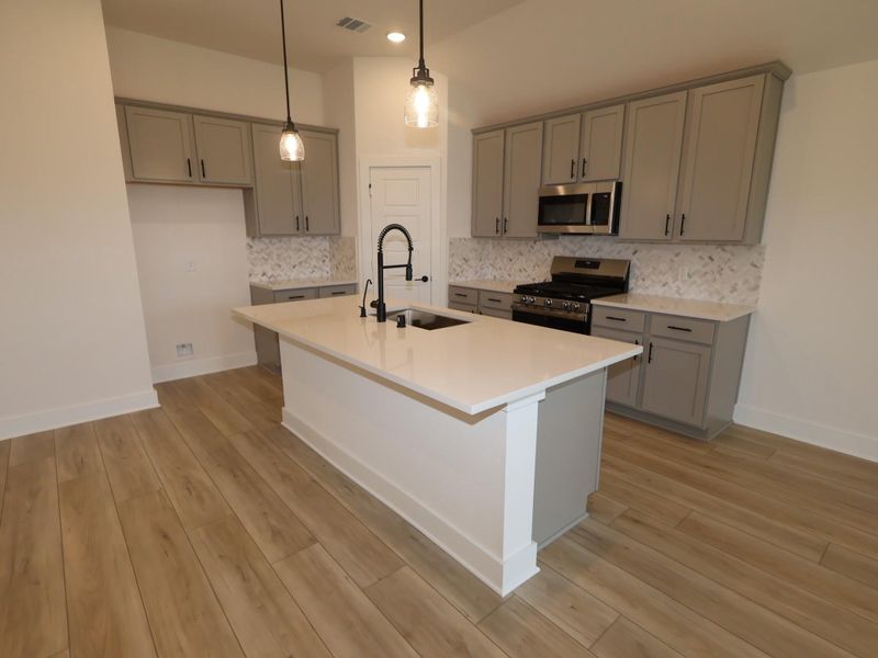 Furnished interior view inside a new home in Lago Mar, Santa Fe (Image 7).