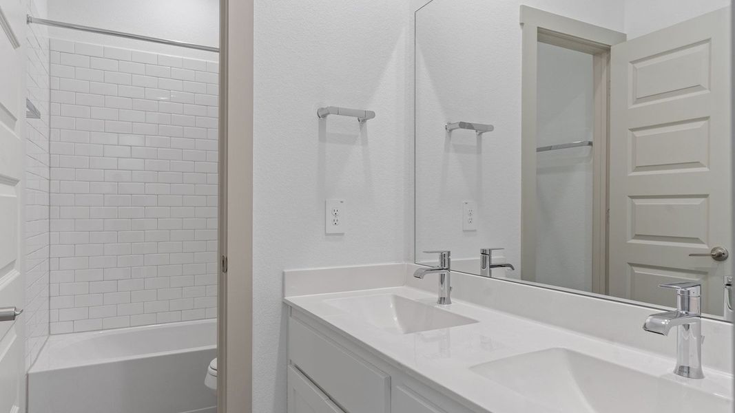 Representative furnished interior of a home built from the Plan by D.R. Horton in Davis Harbor, League City (Image 4).