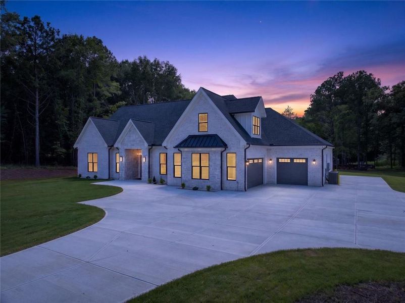 Front exterior of a new home in , Monroe, GA, highlighting curb appeal (Image 27). Front exterior of a new home in , Monroe, GA, highlighting curb appeal (Image 27).