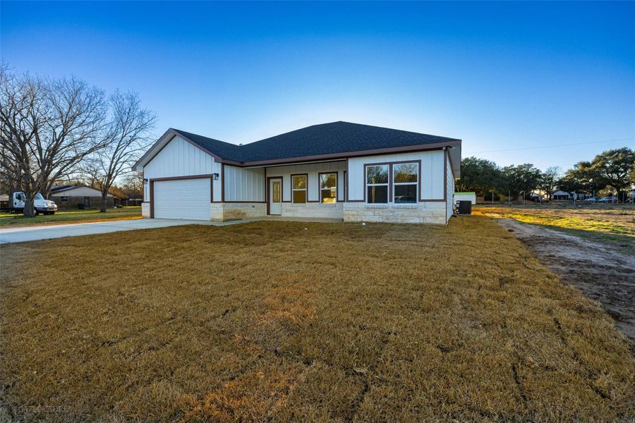 Front exterior of a new home in , Prairie View, TX, highlighting curb appeal (Image 1). Front exterior of a new home in , Prairie View, TX, highlighting curb appeal (Image 1).