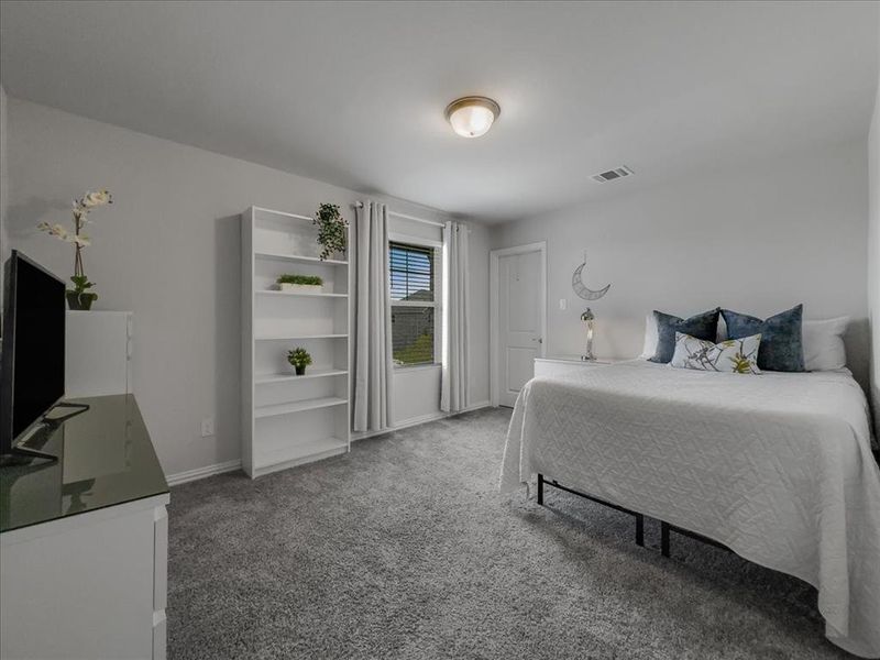 View of carpeted bedroom