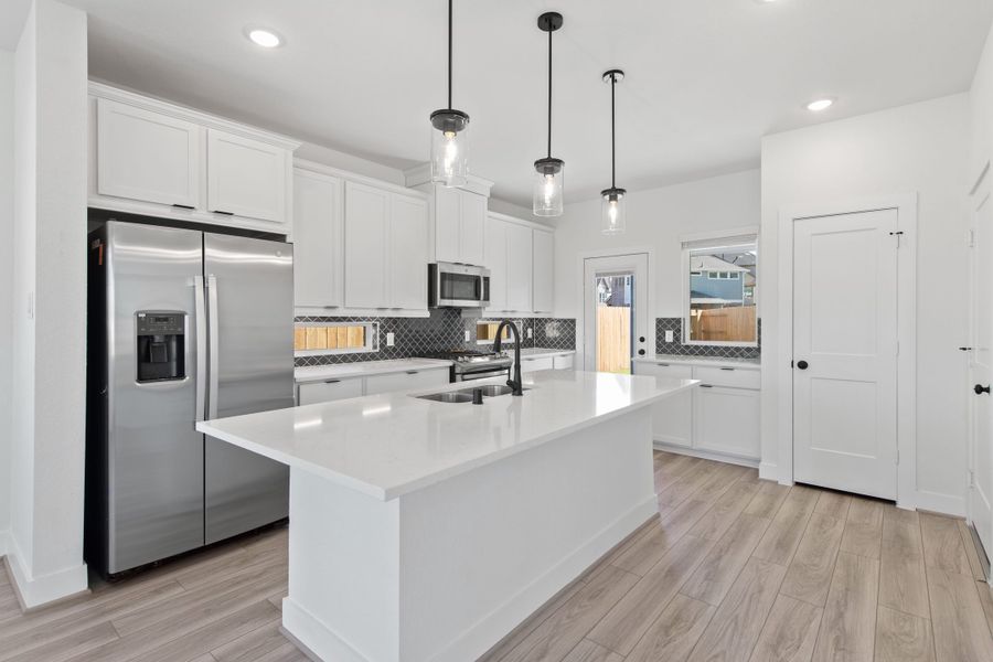 Furnished interior view inside a new home in Sienna, Missouri City (Image 8).