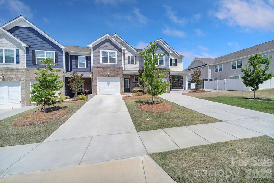 Front exterior of a new home in , Fort Mill, SC, highlighting curb appeal (Image 23).