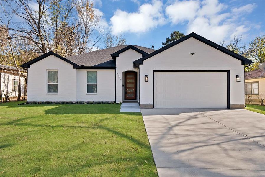 Front exterior of a new home in , Dallas, TX, highlighting curb appeal (Image 1).