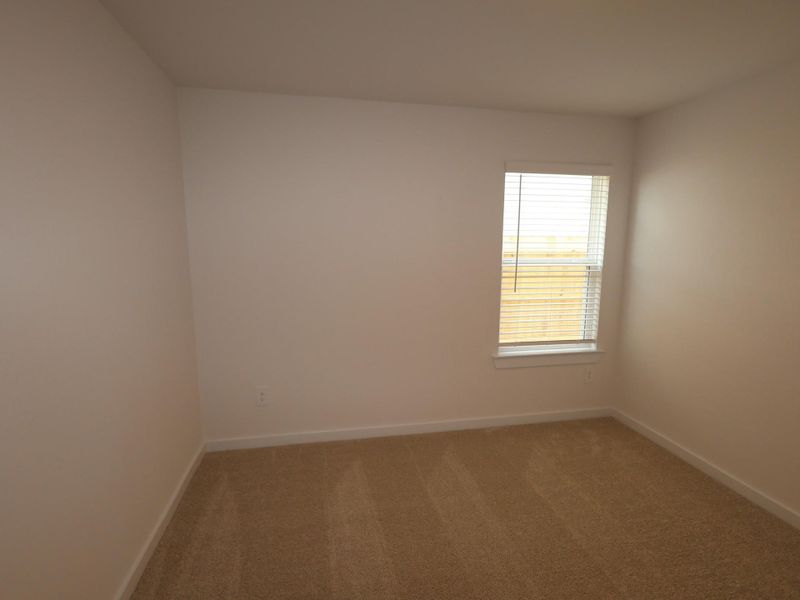 Spacious, unfurnished interior of a new home in Pinewood at Grand Texas, New Caney (Image 12).