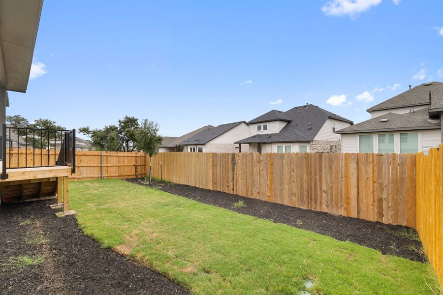 Exterior details and patio area of a home in Heritage, Dripping Springs (Image 28).