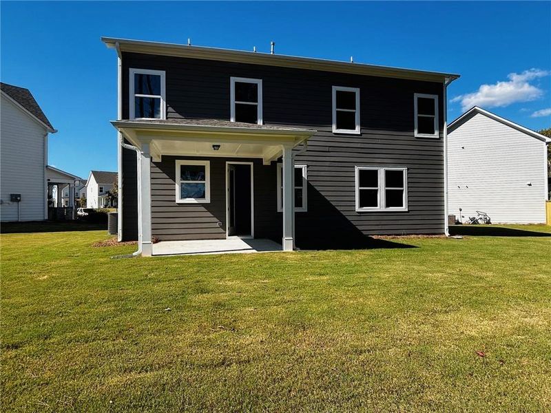Exterior details and patio area of a home in Maddox Landing, Hoschton (Image 2).