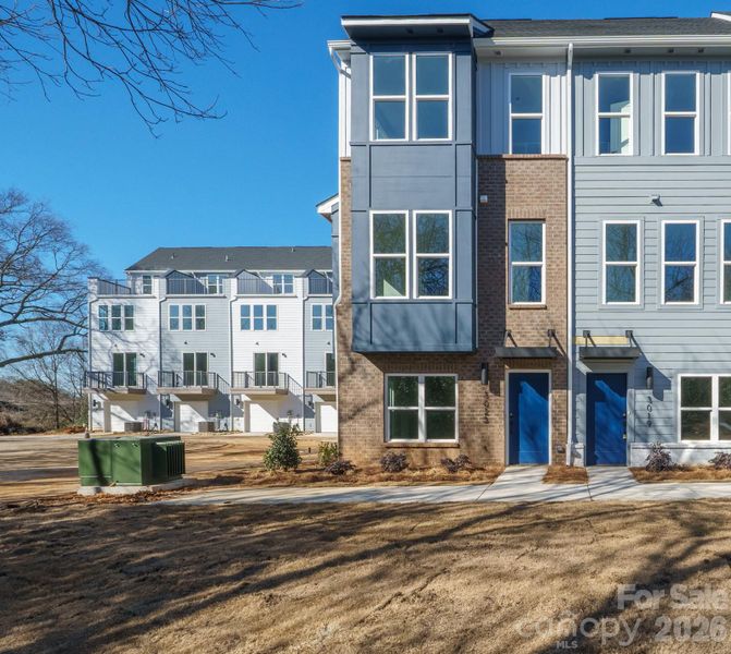 Modern four-level townhome featuring striking contemporary architecture and a prime Charlotte location close to shopping, dining, entertainment, and major commuter routes. Modern four-level townhome featuring striking contemporary architecture and a prime Charlotte location close to shopping, dining, entertainment, and major commuter routes.