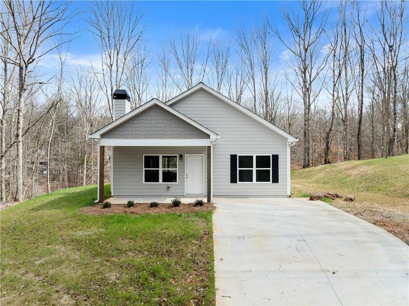 Front exterior of a new home in , Cleveland, GA, highlighting curb appeal (Image 1). Front exterior of a new home in , Cleveland, GA, highlighting curb appeal (Image 1).
