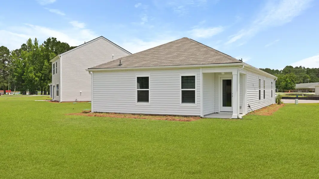 Exterior details and patio area of a home in Lockwood Landing, Supply (Image 3).