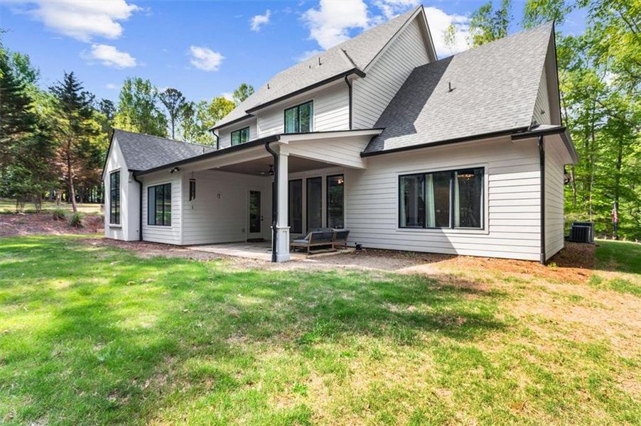 Front exterior of a new home in , Hoschton, GA, highlighting curb appeal (Image 25). Front exterior of a new home in , Hoschton, GA, highlighting curb appeal (Image 25).