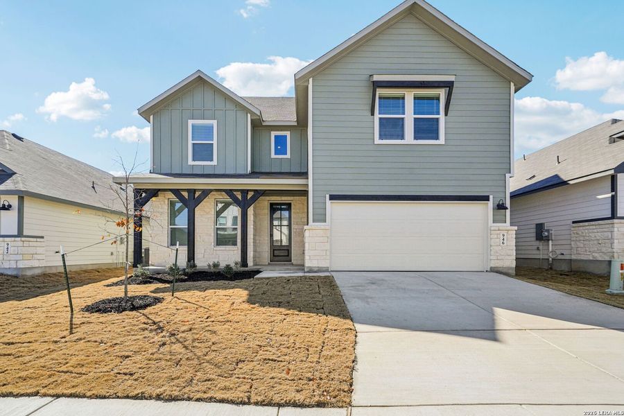 Front exterior of a new home in Estancia Ranch - Classic Series, San Antonio, TX, highlighting curb appeal (Image 2). Front exterior of a new home in Estancia Ranch - Classic Series, San Antonio, TX, highlighting curb appeal (Image 2).