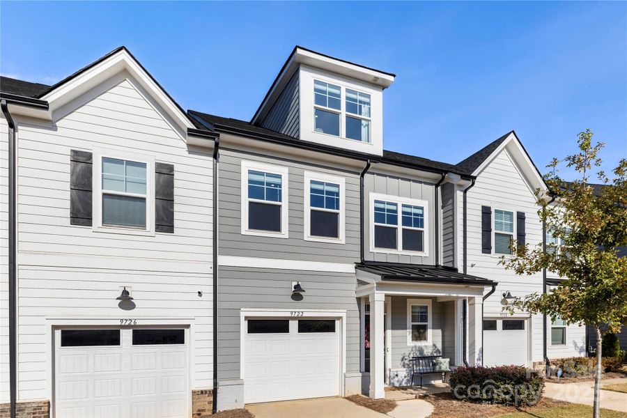 Front exterior of a new home in , Charlotte, NC, highlighting curb appeal (Image 21).