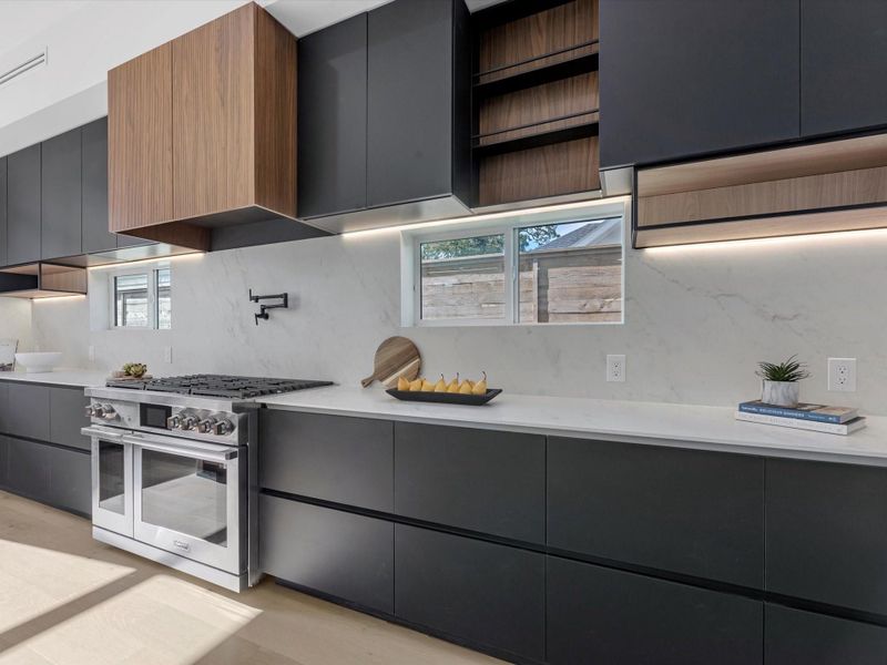 This kitchen will bring out the chef in you, complete with Stosa cabinets. Sparking Stainless Steel Dacor appliances - Gas range and oven.