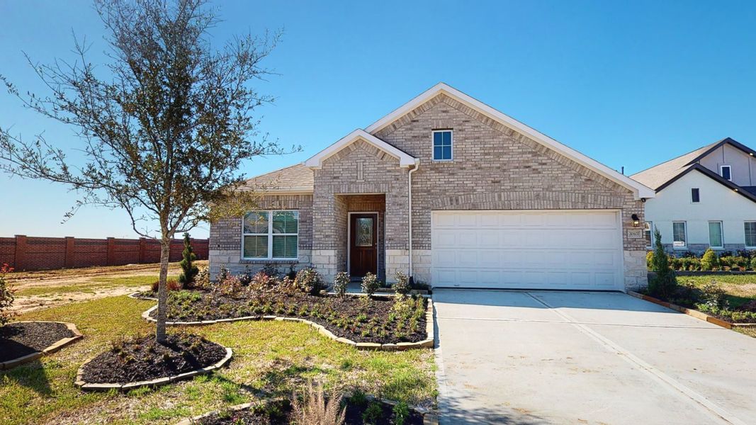 Representative exterior photo of a completed home built from the Floor Plan 2121 by Colina Homes in Grand Magnolia, Magnolia, TX (Image 21). Representative exterior photo of a completed home built from the Floor Plan 2121 by Colina Homes in Grand Magnolia, Magnolia, TX (Image 21).