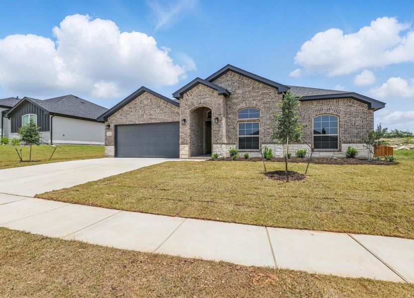 Representative exterior photo of a completed home built from the McKinley I by Cheldan Homes in Horizons at Bankston Estates, Venus, TX (Image 28).