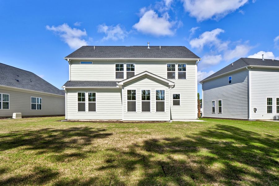 Exterior details and patio area of a home in Grand Park, Leland (Image 3). Exterior details and patio area of a home in Grand Park, Leland (Image 3).