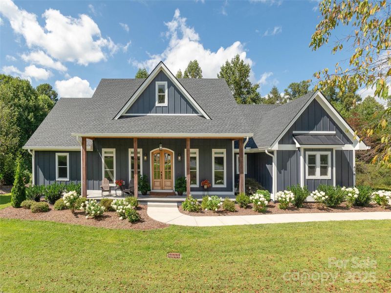 Front exterior of a new home in , Hendersonville, NC, highlighting curb appeal (Image 20).