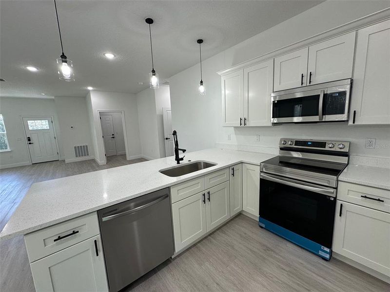 Furnished interior view inside a new home in , Citrus Springs (Image 19).