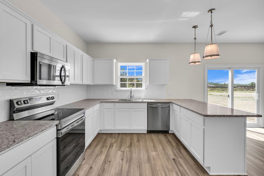 Representative furnished interior of a home built from the The Duncan by RTS Homes in The Village at Sassafras, Allenhurst (Image 5).