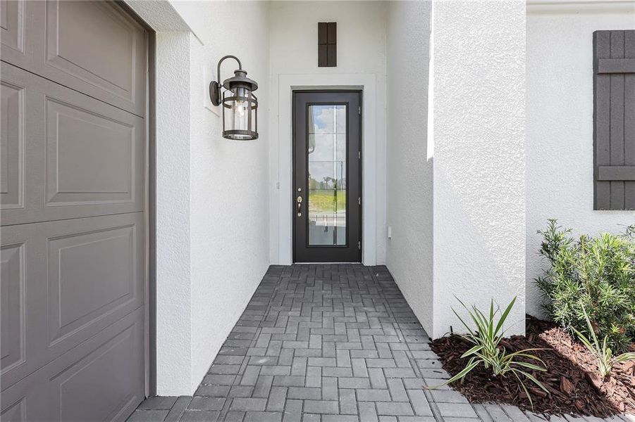 Exterior details and patio area of a home in Woodland Preserve, Parrish (Image 4).