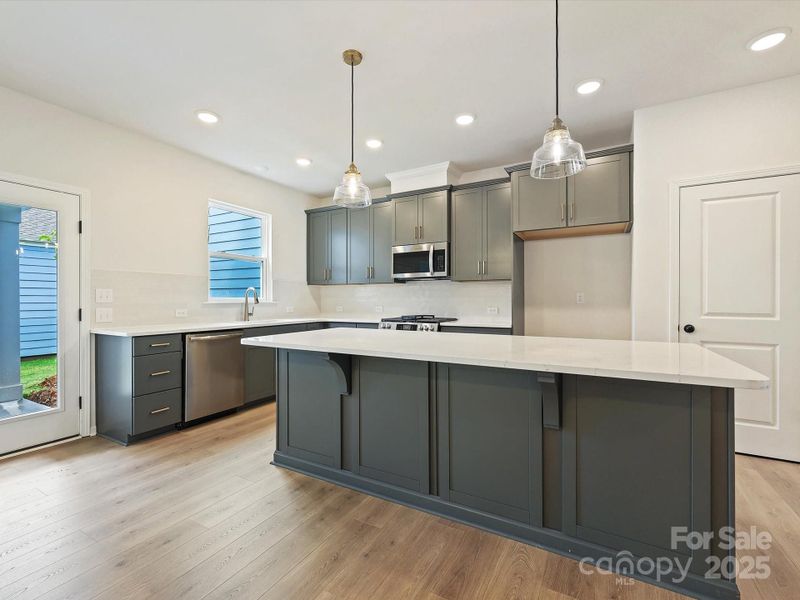 Furnished interior view inside a new home in North Creek Village - Townhomes, Huntersville (Image 8). Furnished interior view inside a new home in North Creek Village - Townhomes, Huntersville (Image 8).