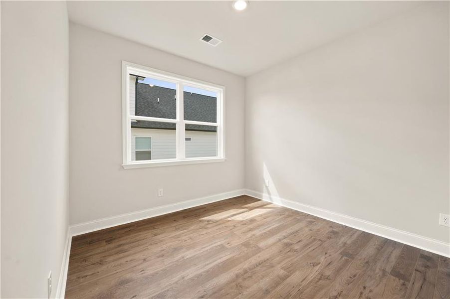Spacious, unfurnished interior of a new home in Oak Ridge Meadows - Active Adult, Locust Grove (Image 13).