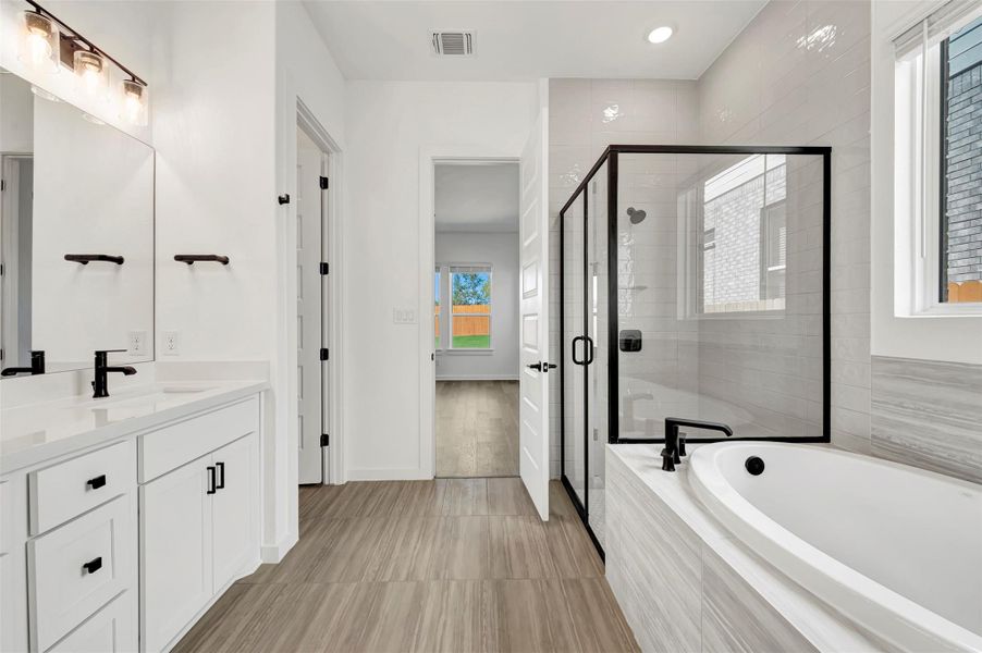 Furnished interior view inside a new home in Heritage, Dripping Springs (Image 14).