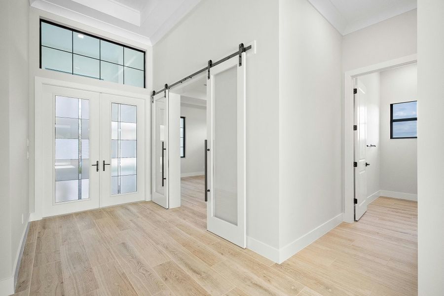 Representative unfurnished interior of a home built from the Alessia 58 by GHO Homes in Tesoro Club, Port St. Lucie (Image 29).