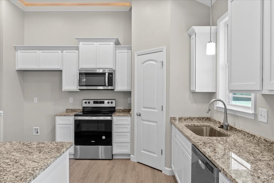 Representative furnished interior of a home built from the Cherokee by Enchanted Homes in Ballentine Ridge, Lyman (Image 13).