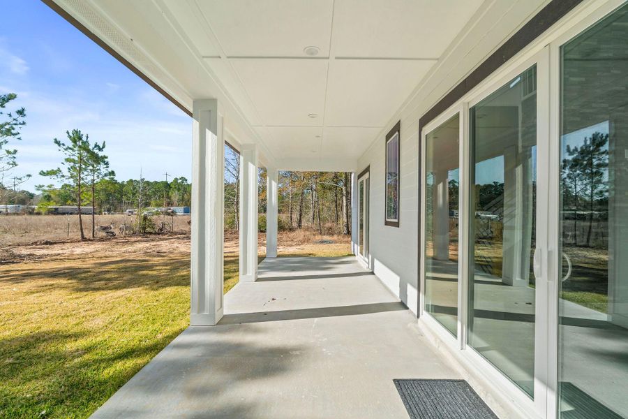Exterior details and patio area of a home in , Waller (Image 3).