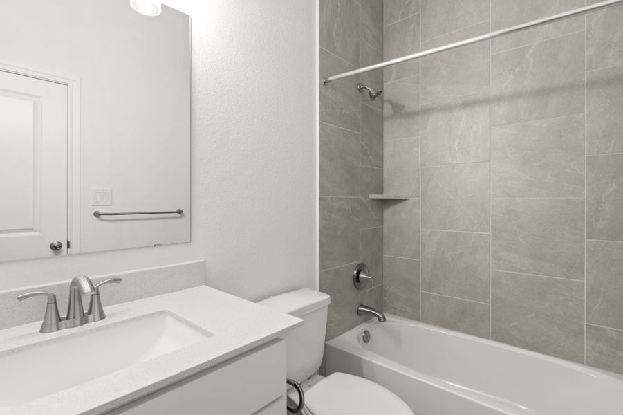 Furnished interior view inside a new home in Village at Three Oaks, Seguin (Image 14).