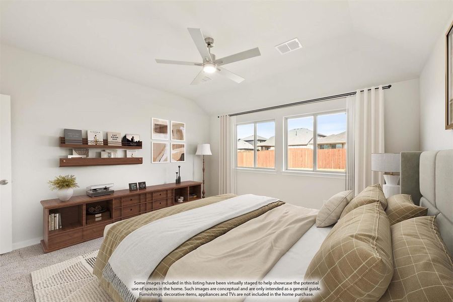 Bedroom with vaulted ceiling, ceiling fan, large window, and wood dresser with wall shelves