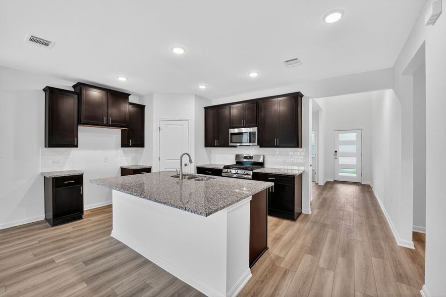 Furnished interior view inside a new home in Lisso, Pflugerville (Image 6).