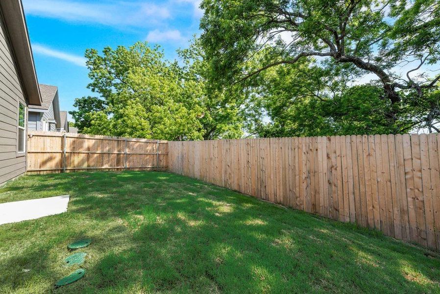 Front exterior of a new home in Cottonwood, Wilmer, TX, highlighting curb appeal (Image 15). Front exterior of a new home in Cottonwood, Wilmer, TX, highlighting curb appeal (Image 15).