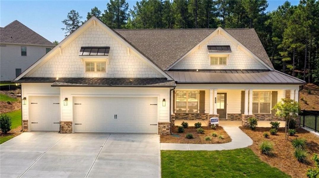 Front exterior of a new home in Soleil Belmont Park, Canton, GA, highlighting curb appeal (Image 2). Front exterior of a new home in Soleil Belmont Park, Canton, GA, highlighting curb appeal (Image 2).