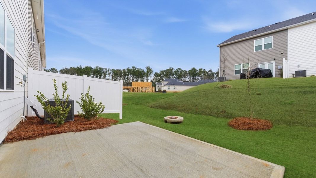 Exterior details and patio area of a home in Independence Villas and Townhomes, Loganville (Image 2).