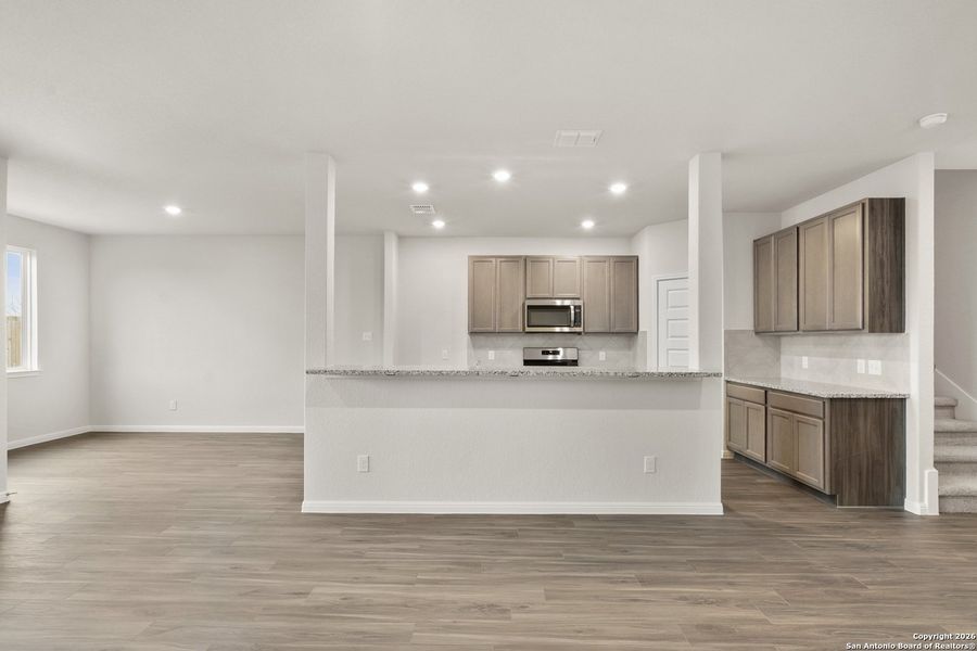 Furnished interior view inside a new home in Timber Creek, San Antonio (Image 6).