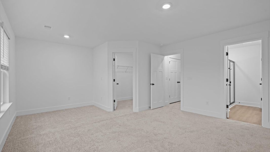 Spacious and serene primary suite with thoughtful design in a desirable DRB Homes community Spacious and serene primary suite with thoughtful design in a desirable DRB Homes community