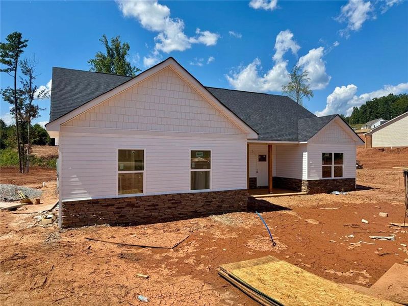 Front exterior of a new home in , Eastanollee, GA, highlighting curb appeal (Image 17). Front exterior of a new home in , Eastanollee, GA, highlighting curb appeal (Image 17).