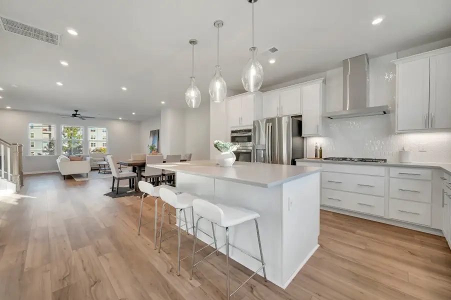 Representative furnished interior of a home built from the Nola by Tri Pointe Homes in Twinleaf Townes, Chapel Hill (Image 5).
