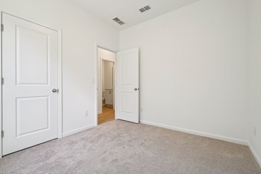 Representative unfurnished interior of a home built from the Grove by Ashton Woods in Middleton Farms, Middlesex (Image 23).