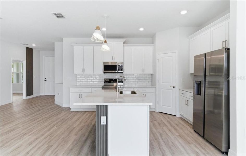 Furnished interior view inside a new home in , North Port (Image 6).