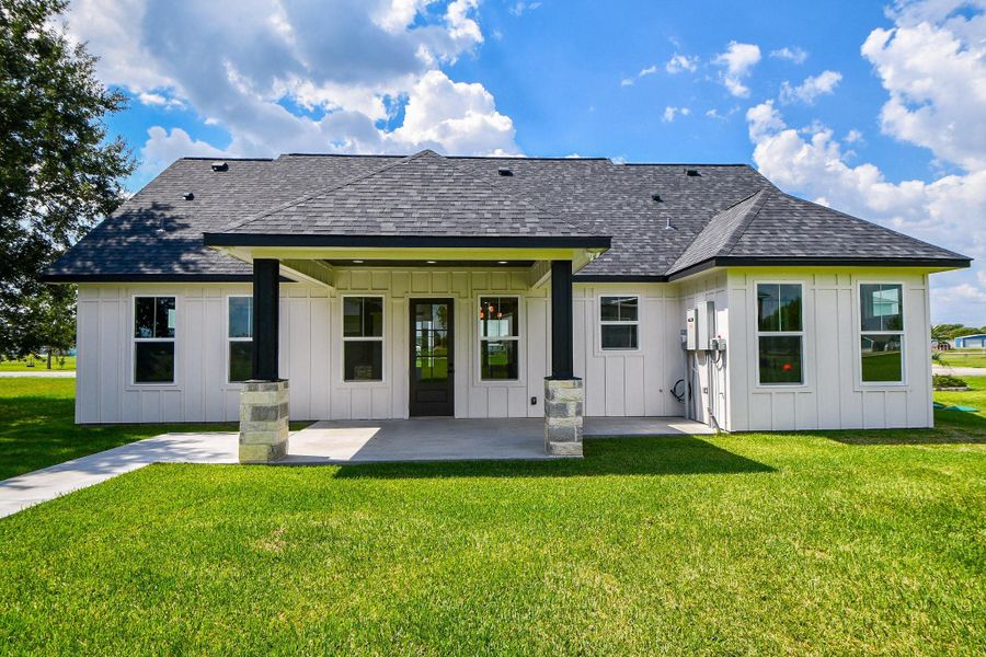 Exterior details and patio area of a home in , Palacios (Image 22). Exterior details and patio area of a home in , Palacios (Image 22).