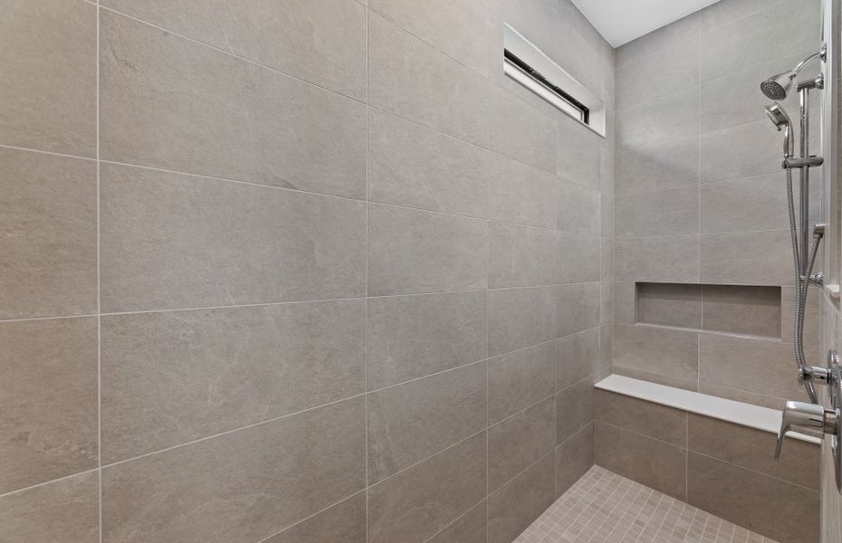 Walk-in shower in the owner's suite