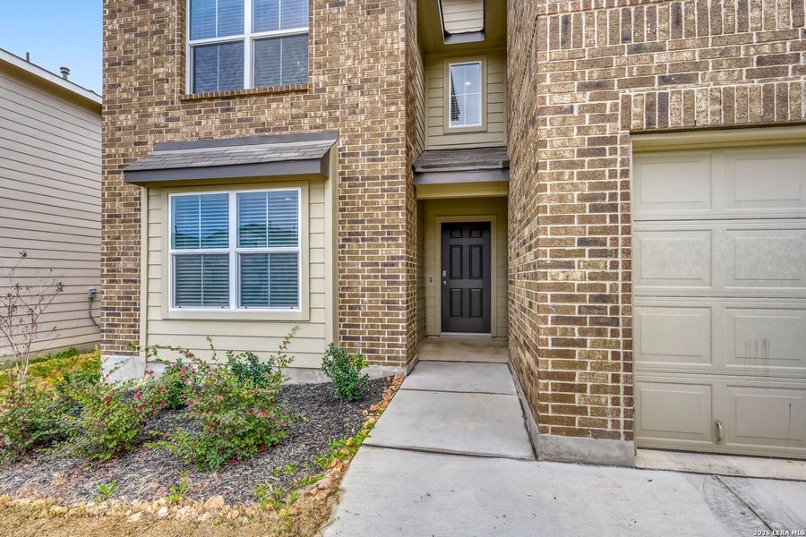Exterior details and patio area of a home in Redbird Ranch, San Antonio (Image 24).
