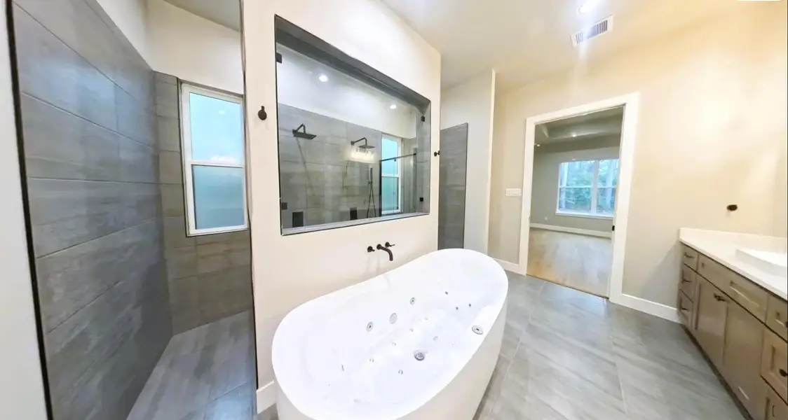 Furnished interior view inside a new home in , Conroe (Image 9).