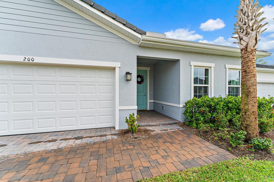 Exterior details and patio area of a home in Banyan Bay, Stuart (Image 43).
